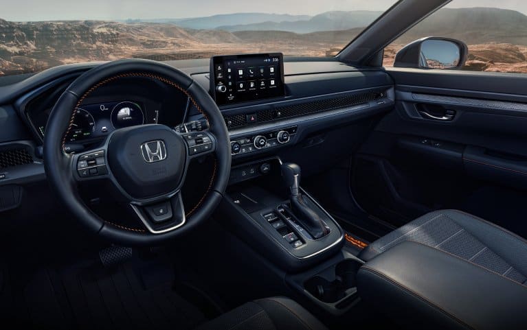 2026 Honda CR-V interior vehicle showing canyon landscape through windows. 2026 Honda CR-V interior vehicle showing canyon landscape through windows.